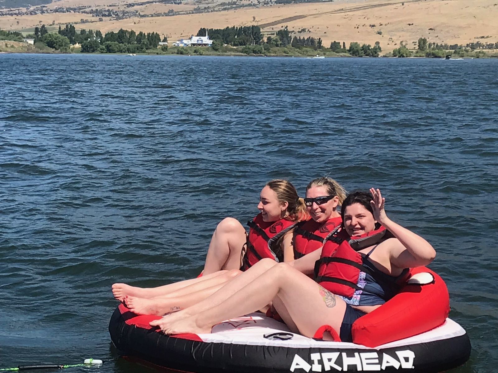 Rebecca, Melissa, and a friend out on the water together